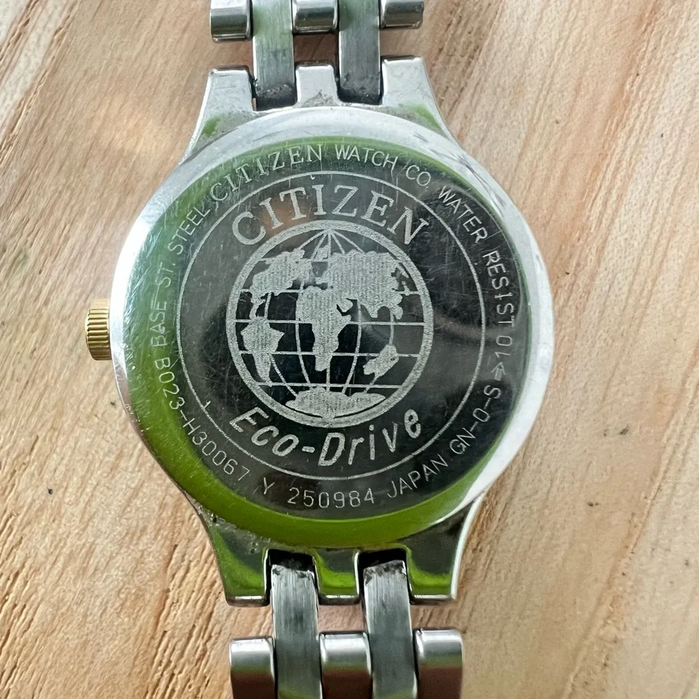 Citizen eco drive ladies black dial two tone dress solar watch
